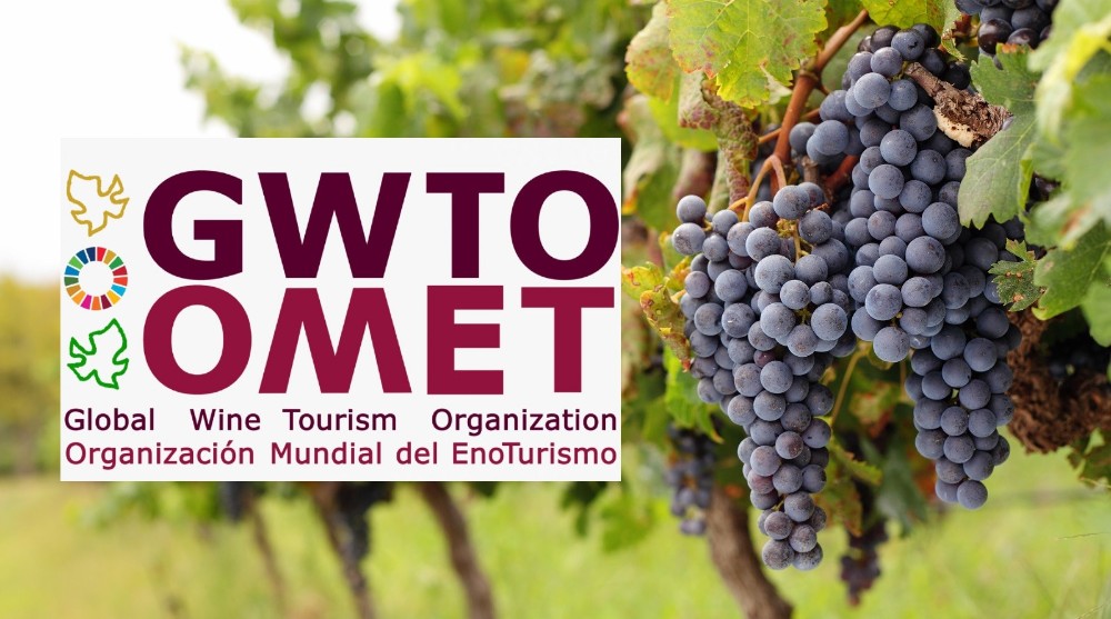 viñedo y logo de la OMET