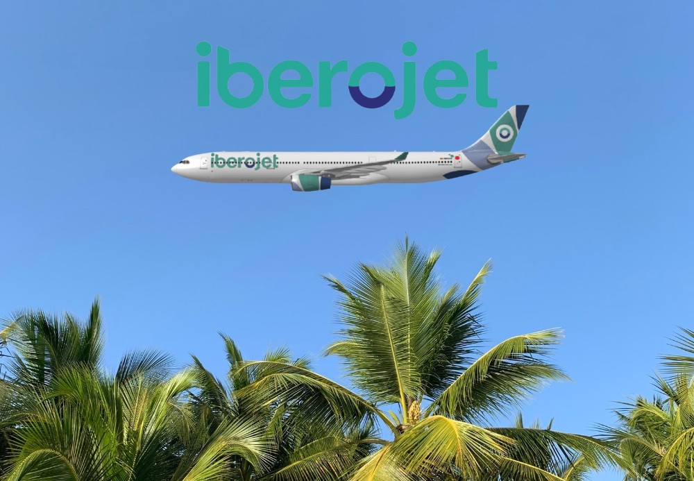 palmeras, ación y logo de Iberojet encima